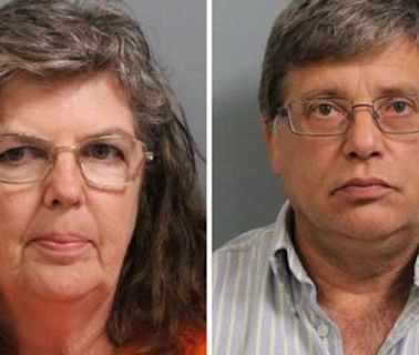 West Virginia white couple alleged to have kept five adopted black children 'locked in barn and used as slaves'