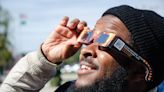 Clear weather prompts Tri-Citians to don glasses for 1st solar eclipse in 7 years