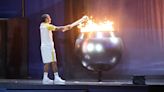 Who lit the Olympic flame? Meet France's final torch bearers for 2024 opening ceremony | Sporting News