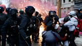 Clashes in Paris as hundreds of thousands across France march against plan to raise retirement age