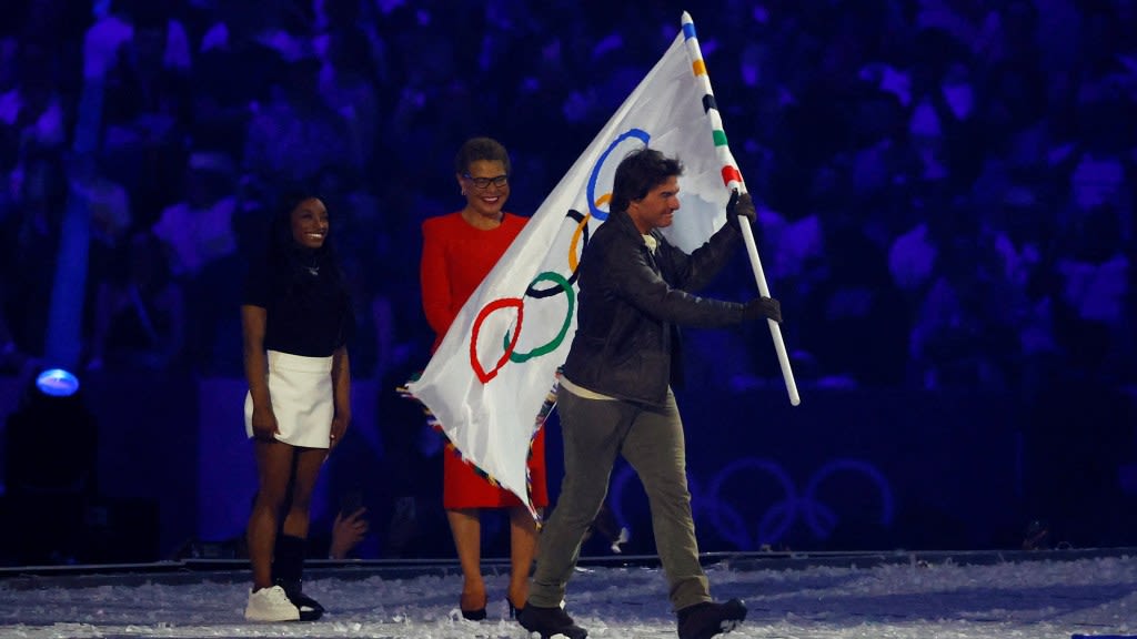 Simone Biles revealed why her flag handoff with Tom Cruise was the most stressful part of the Olympics