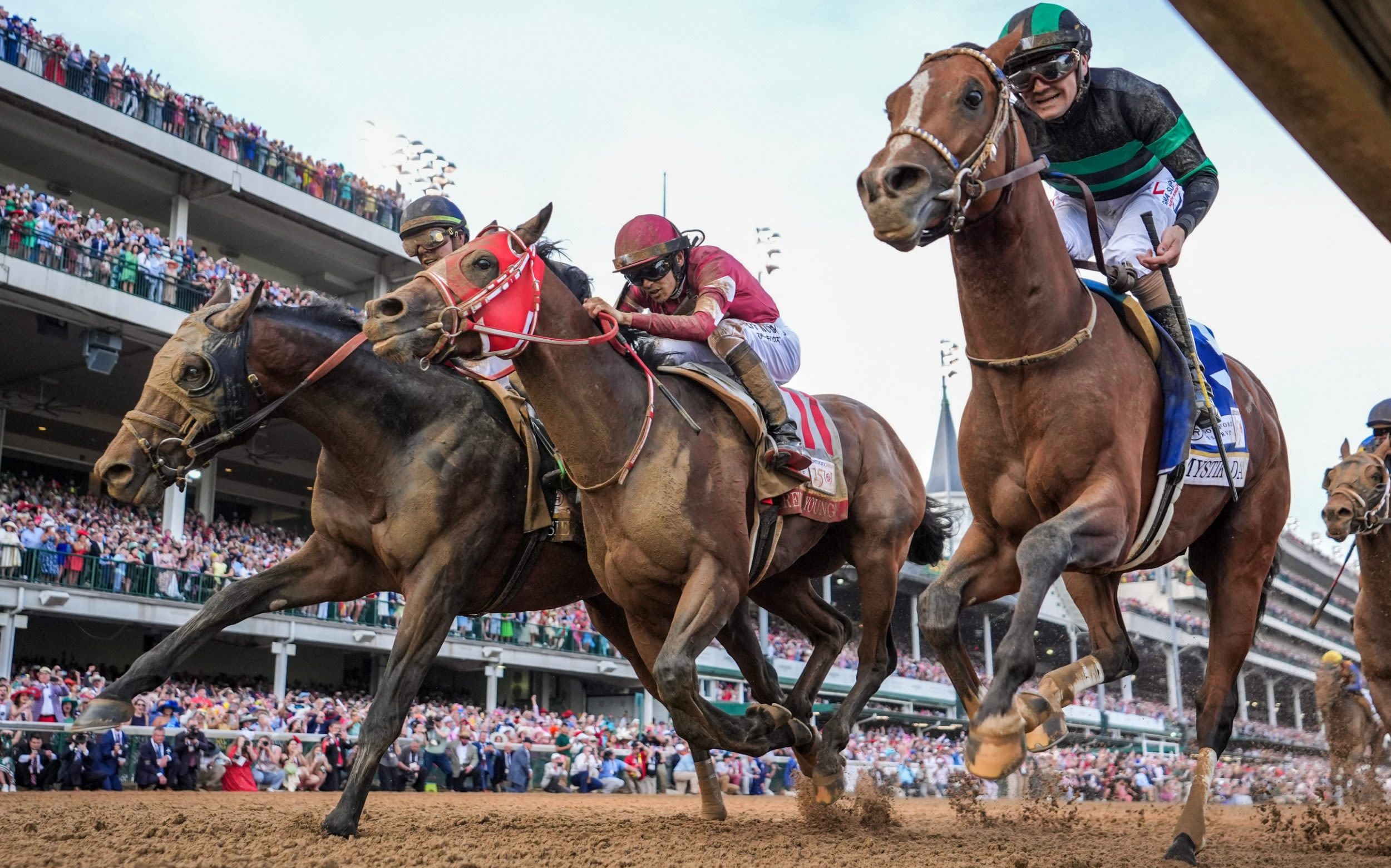 Mystik Dan, at 18-1, edges out two rivals to win the 150th Kentucky Derby