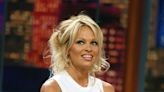 Pamela Anderson reveals the secret to achieving her famously tousled updo is a G-string thong