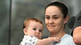 Ash Barty holds son Hayden during the Billie Jean King Cup in Brisbane