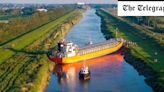 Cargo ship becomes wedged across Cambridgeshire river