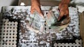 Rupee dips tracking Asia FX, eyes Fed chief testimony this week