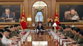 North Korean leader Kim calls for his military to sharpen war plans as his rivals prepare drills