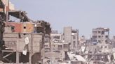 Palestinians return to rubble in Gaza City after Israeli withdrawal