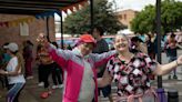 With free laundry and salsa classes, Bogotá tries to care for its unpaid caregivers