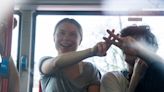 Greta Thunberg flashes victory sign after police detain her at Hague climate protest