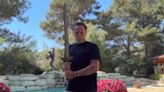 Arnold Schwarzenegger Uses His “Conan the Barbarian” Sword to Open First Box of Copies of His New Book