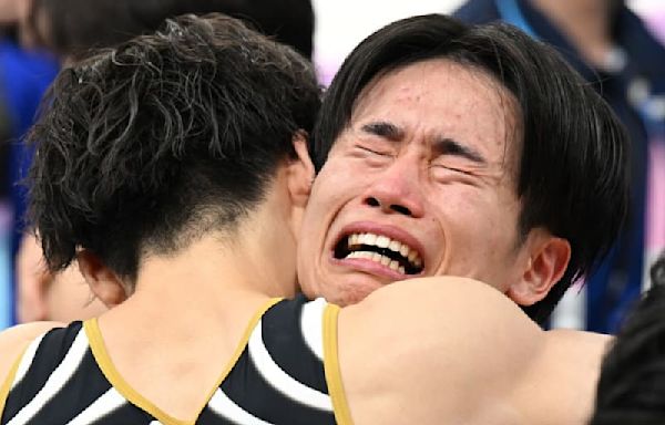 Japan win men's team gymnastics gold after late China collapse