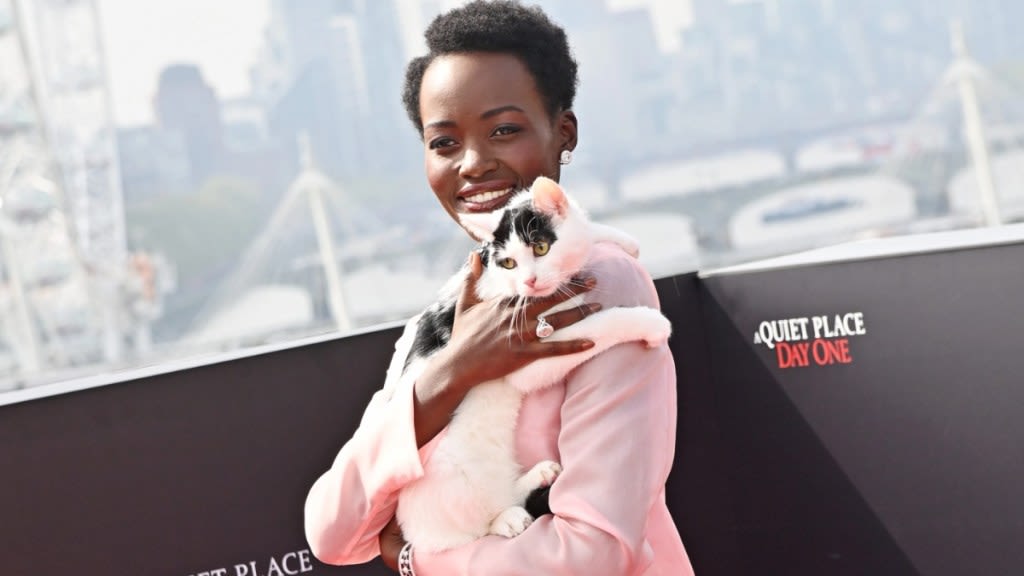 Lupita Nyong’o Cradles Cat for ‘A Quiet Place: Day One’ Photo Call