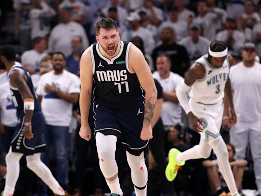 Luka Doncic, Kyrie Irving combine for 63 points as Mavericks steal Game 1 vs. Timberwolves