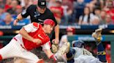 Hoskins homers in return to Philly, but Dahl goes deep in Phillies debut to key 3-1 win over Brewers