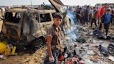 War in Gaza could last another seven months, Israel warns