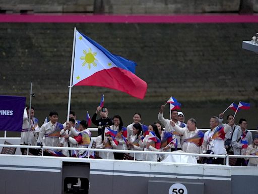 LOOK: Philippine Olympic centennial team revels in Paris opening ceremony