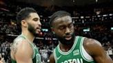Boston's Jayson Tatum and Jaylen Brown celebrate the Celtics' victory over the Cleveland Cavaliers in game four of their NBA playoff series