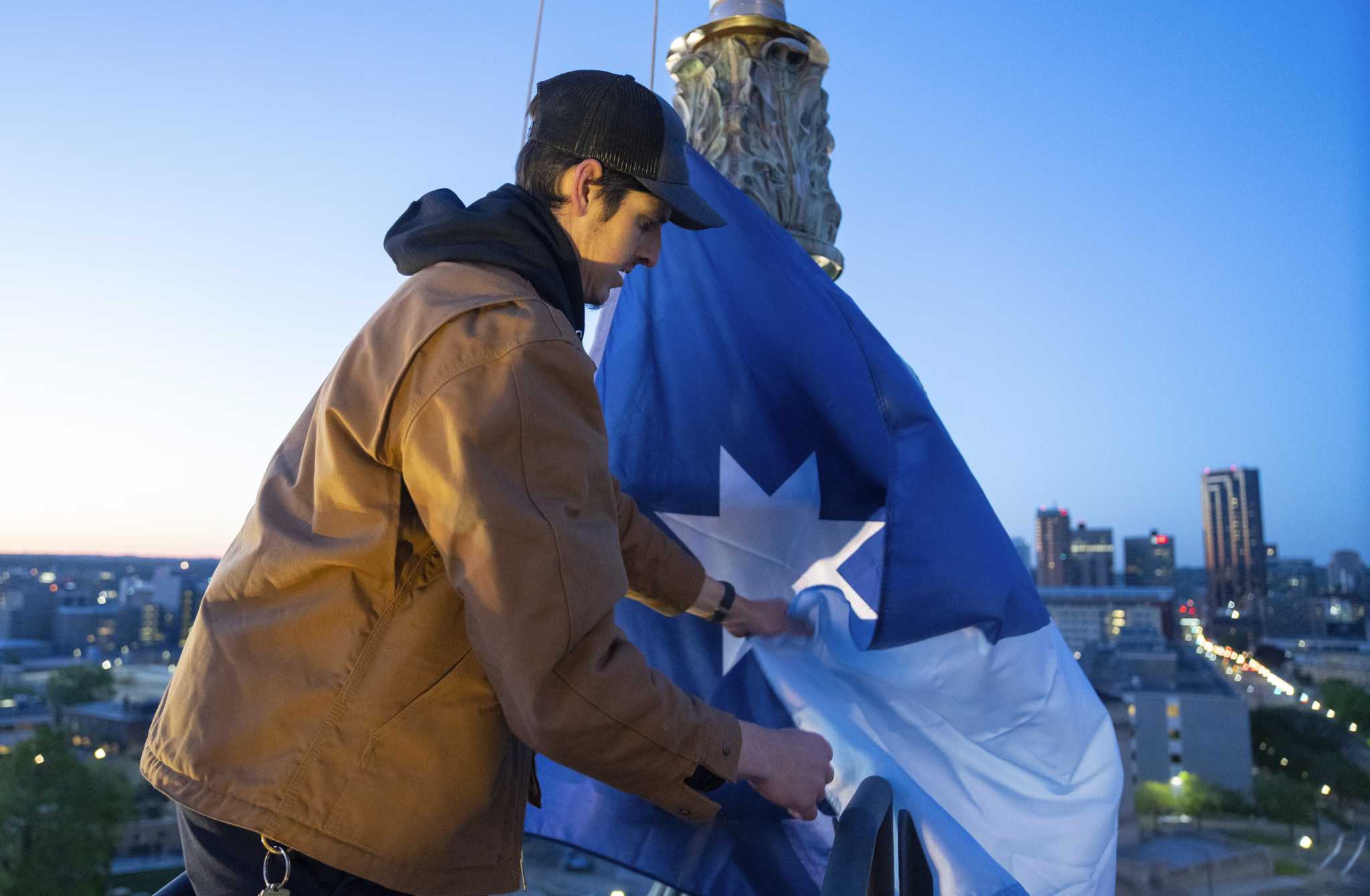 Minnesota unfurls new state flag atop the capitol for the first time Saturday