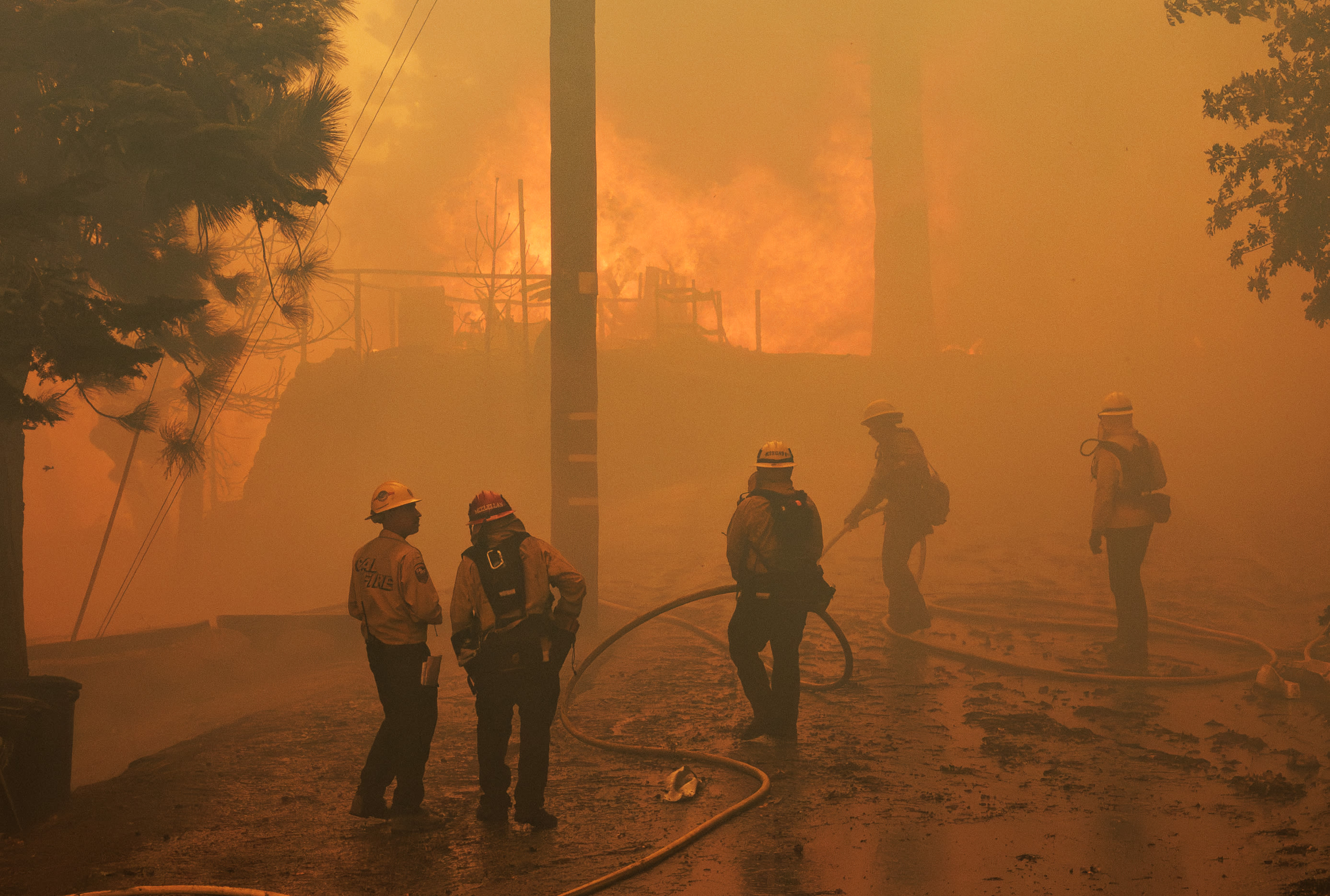 'Moonscape': Airport fire evacuees wait, and hope the blaze spares them