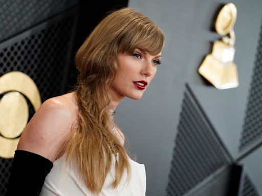 No habrá cargos contra el padre de Taylor Swift por incidente con paparazzi en Australia