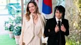 Angelina Jolie Wears Breezy Ivory Dress on Rare Outing with Son Maddox