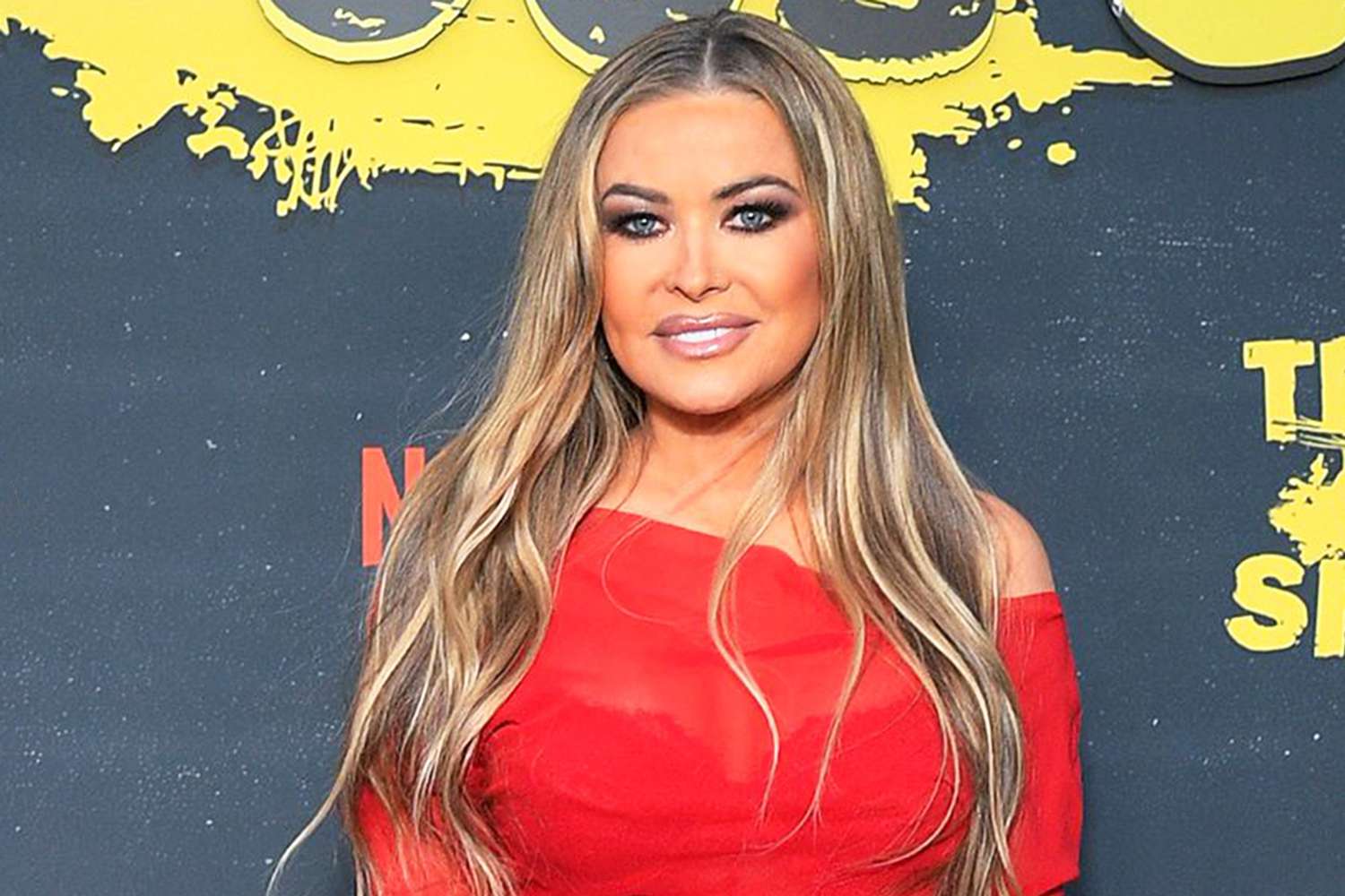 Carmen Electra’s 'Baywatch' Red Latex Look at 'That ‘90s Show' Premiere Wasn’t Actually Inspired by the ‘90s (Exclusive)