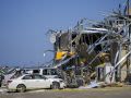 At least 11 dead, dozens injured, as suspected tornadoes leave trail of destruction across the South