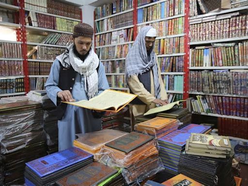 Phones, Islamic books and currency exchange. Some businesses are making money out of Taliban rule