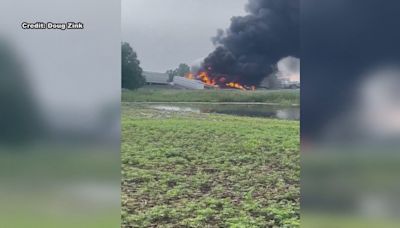 Rail cars carrying hazardous material derail and catch fire in North Dakota