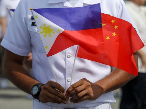 China and the Philippines reach deal in effort to stop clashes at fiercely disputed shoal