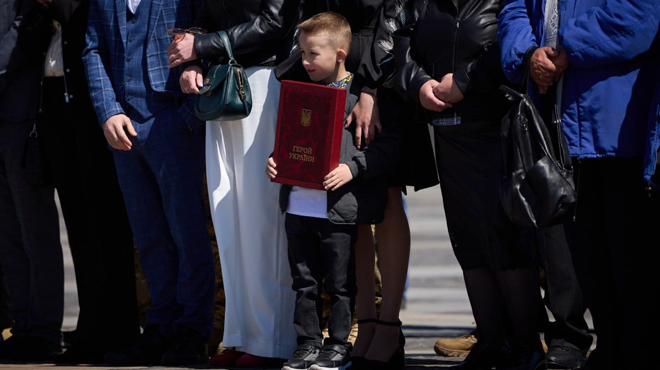 Zelenskyy presents awards to families of fallen Heroes of Ukraine on Day of Remembrance and Victory over Nazism – video