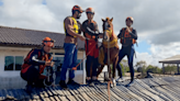 Horse stranded on rooftop by Brazil floods is rescued after stirring the nation