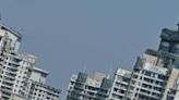 Shanghai lifts home-buying curbs to boost property sector