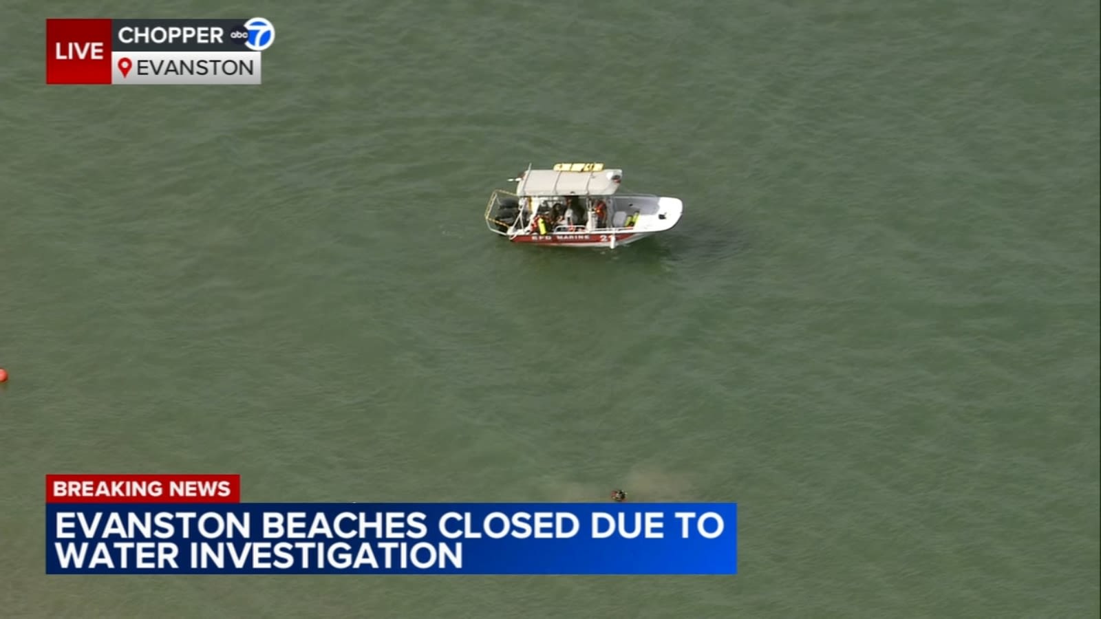 Evanston beaches closed as crews search for missing swimmer, police say | LIVE
