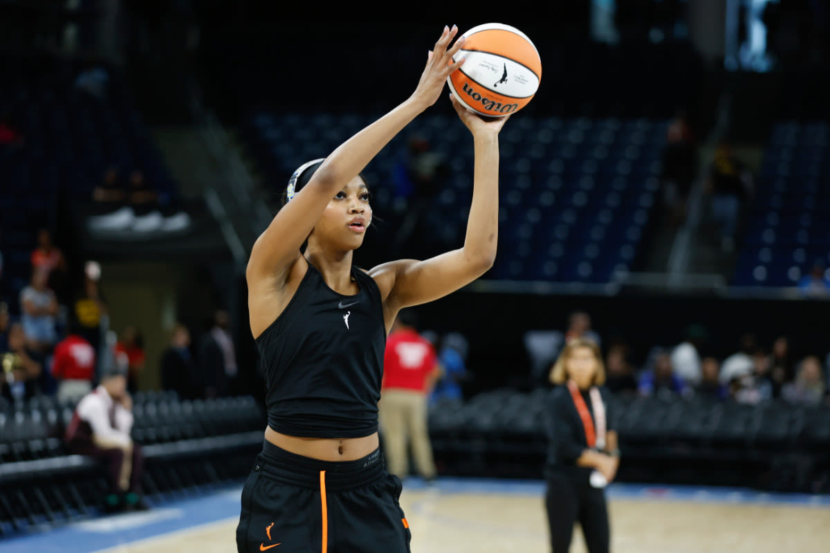 Caitlin Clark Catches Strays After Angel Reese's Three-Point Display During WNBA Game