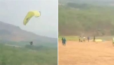 Horror moment paraglider plummets to his death after his parachute becomes tangled in front of shocked onlookers