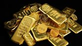 Gold eases, investors seek more cues on Fed's rate path