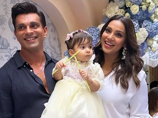 Karan Singh Grover reveals why he changes his daughter Devi's diapers despite having a nanny: 'I don't want anybody to..' - Times of India