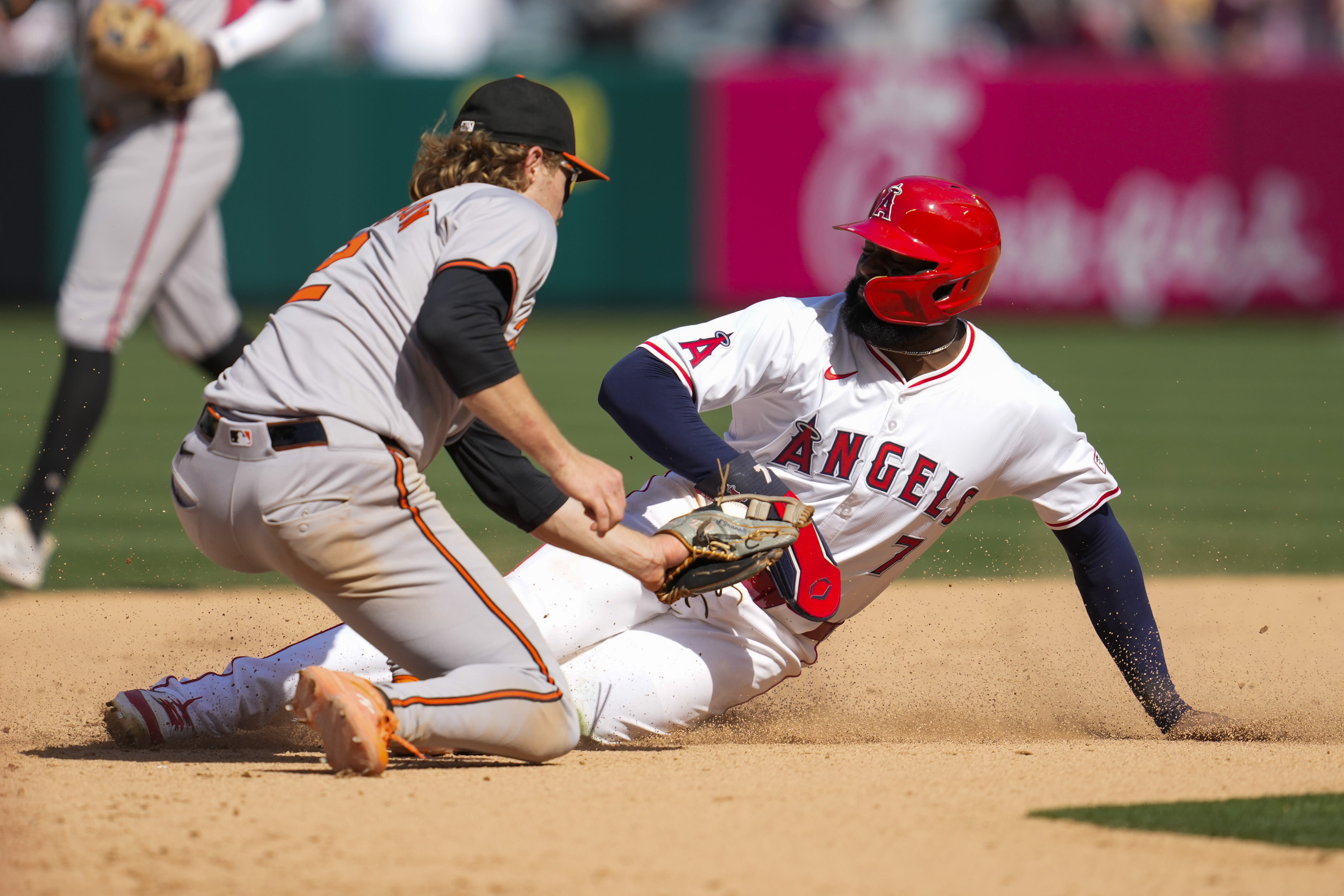 Orioles hold off Angels by throwing out base stealer. Trout becomes 1st in majors to reach 10 homers