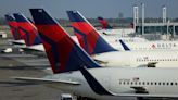 Fitch restores Delta's investment-grade rating