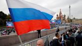 Moscow demonstrators demand Biden’s resignation and ‘withdrawal of NATO troops’ from post-Soviet countries