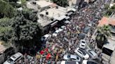 Angry Palestinians mourn 12 killed in Israeli military operation in Jenin