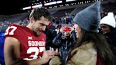 Oklahoma punter Michael Turk proposes to Sooners softball star Grace Lyons after Bedlam win