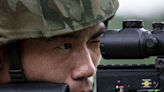 Chinese troops 'seize enemy airport' on NATO border in chilling drill