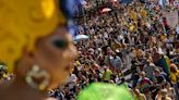 Gay pride revelers in Sao Paulo reclaim Brazil’s national symbols