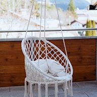 Made of a suspended fabric or netting that forms a comfortable seat Can be made of cotton, polyester, or other materials Often have a casual and relaxed look Require a sturdy support structure to hang from