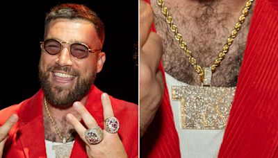 Travis Kelce’s Super Bowl Ring Ceremony ‘Fit Included the Most Blinged-Out ‘TK’ Necklace We’ve Ever Seen