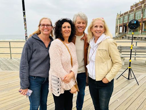 Jon Bon Jovi, and his guitar, make a surprise appearance on the Asbury Park boardwalk