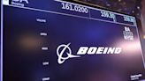 Boeing starts hiring freeze, weighs temporary furloughs